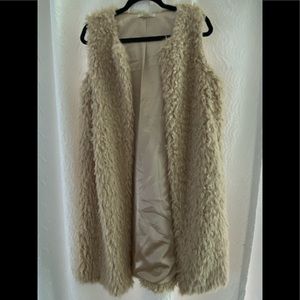 Faux sheep sleeveless coat, never worn
